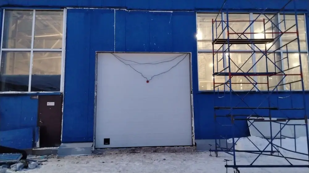 Подготовка проема и монтаж секционных ворот 